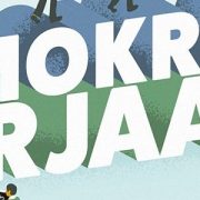 demokratiakorjaamo-teksti jonka äärellä ihmiset yhdistävät palapelin paloja.